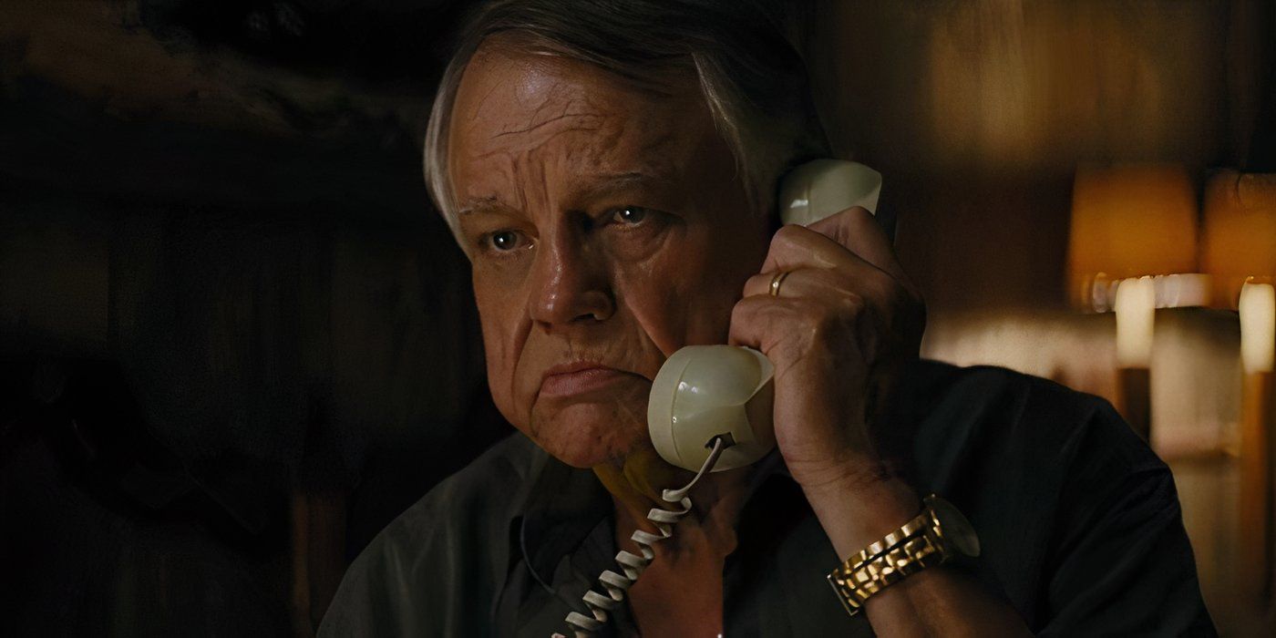 King looks distraught while talking on the phone in Mud