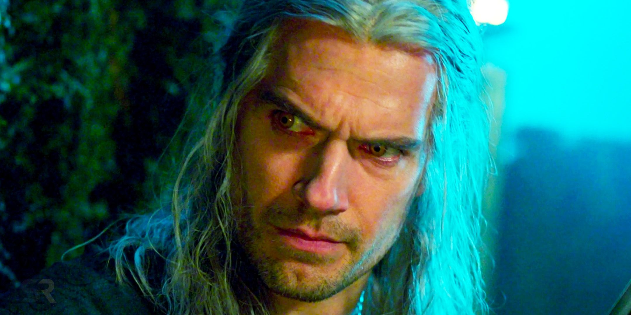 Geralt of Rivia (Henry Cavill) staring at someone in The Witcher.