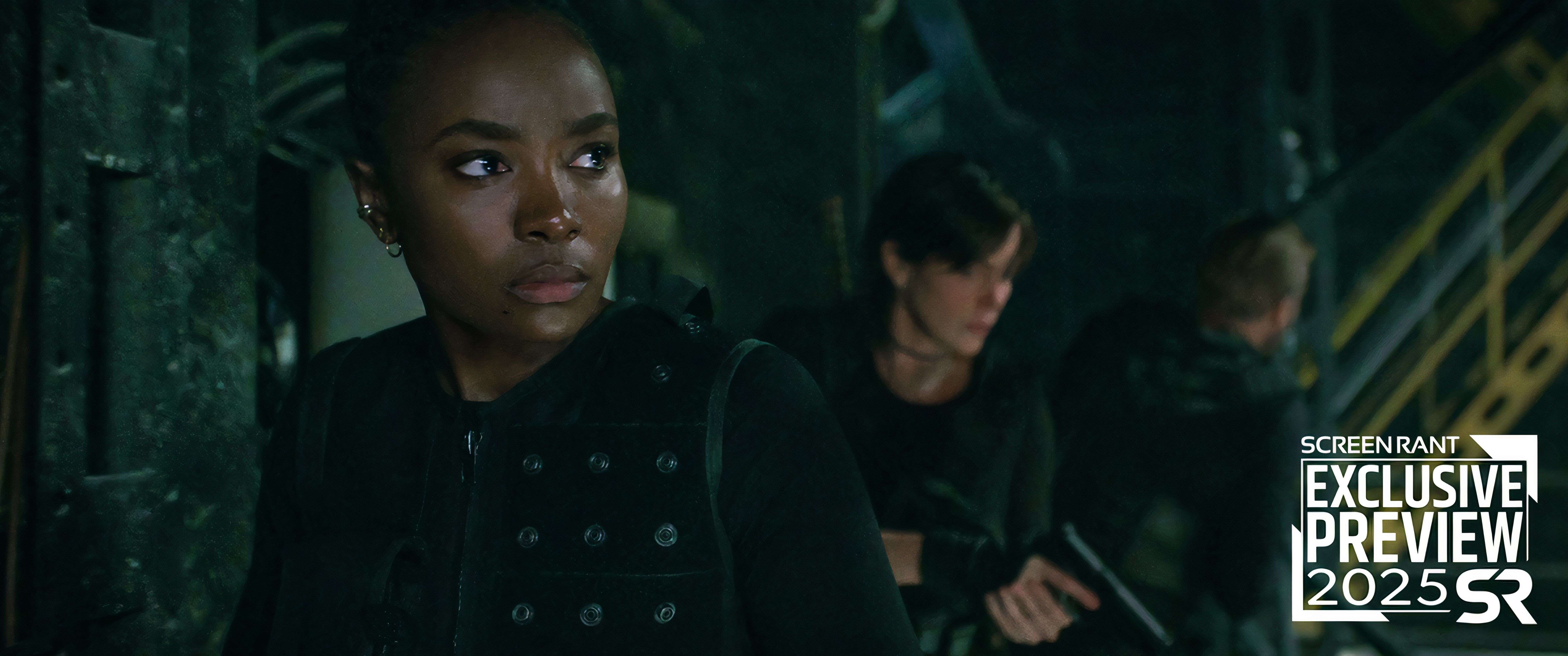 KiKi Layne as Nile with Charlize Theron behind her with a gun in The Old Guard 2