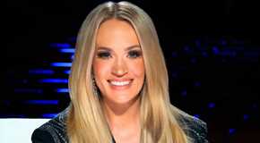 American Idol Season 23 Judge Carrie Underwood Smiling at the Judges' Table