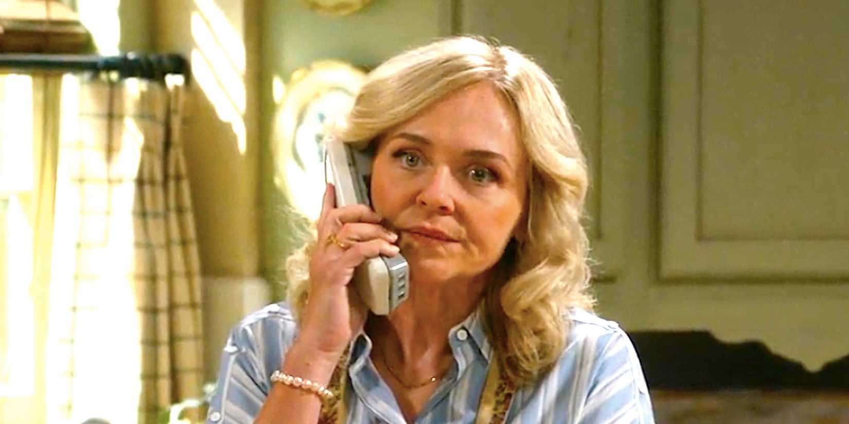 Rachel Bay Jones's Audrey looks angry on the phone standing in a kitchen from Georgie & Mandy's First Marriage episode 19