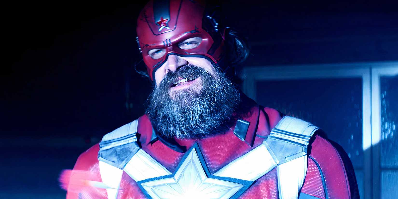 Red Guardian smirking while standing in a spotlight in Black Widow