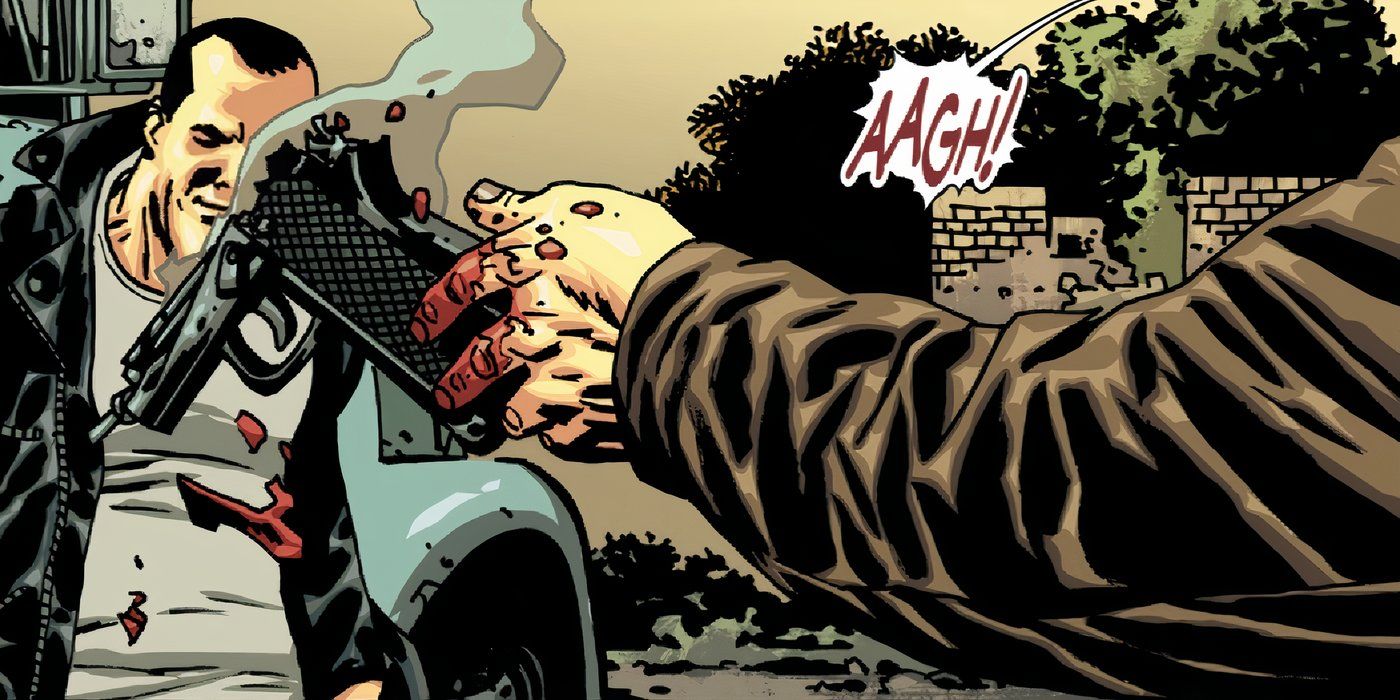Rick Grimes gets gun shot from hand with Negan looking on in the background smiling