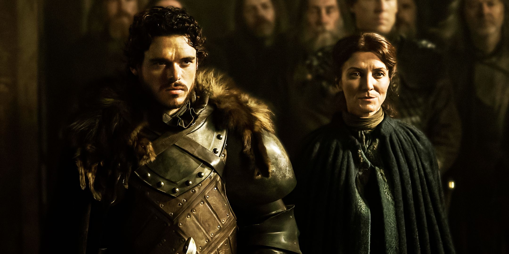 Robb And Catelyn Stark Standing Side By Side In Game Of Thrones Season 3