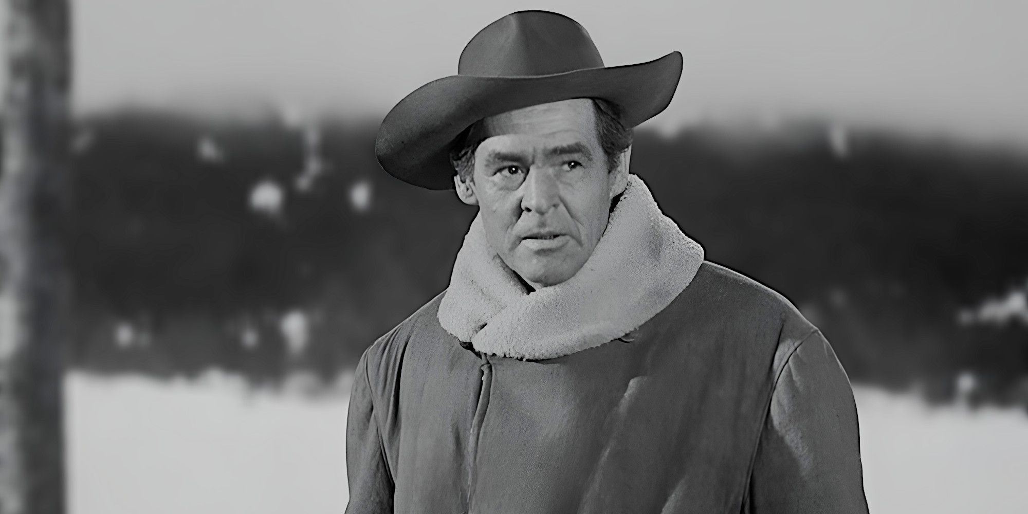 Robert Ryan glares severely in a scene from Day of the Outlaw
