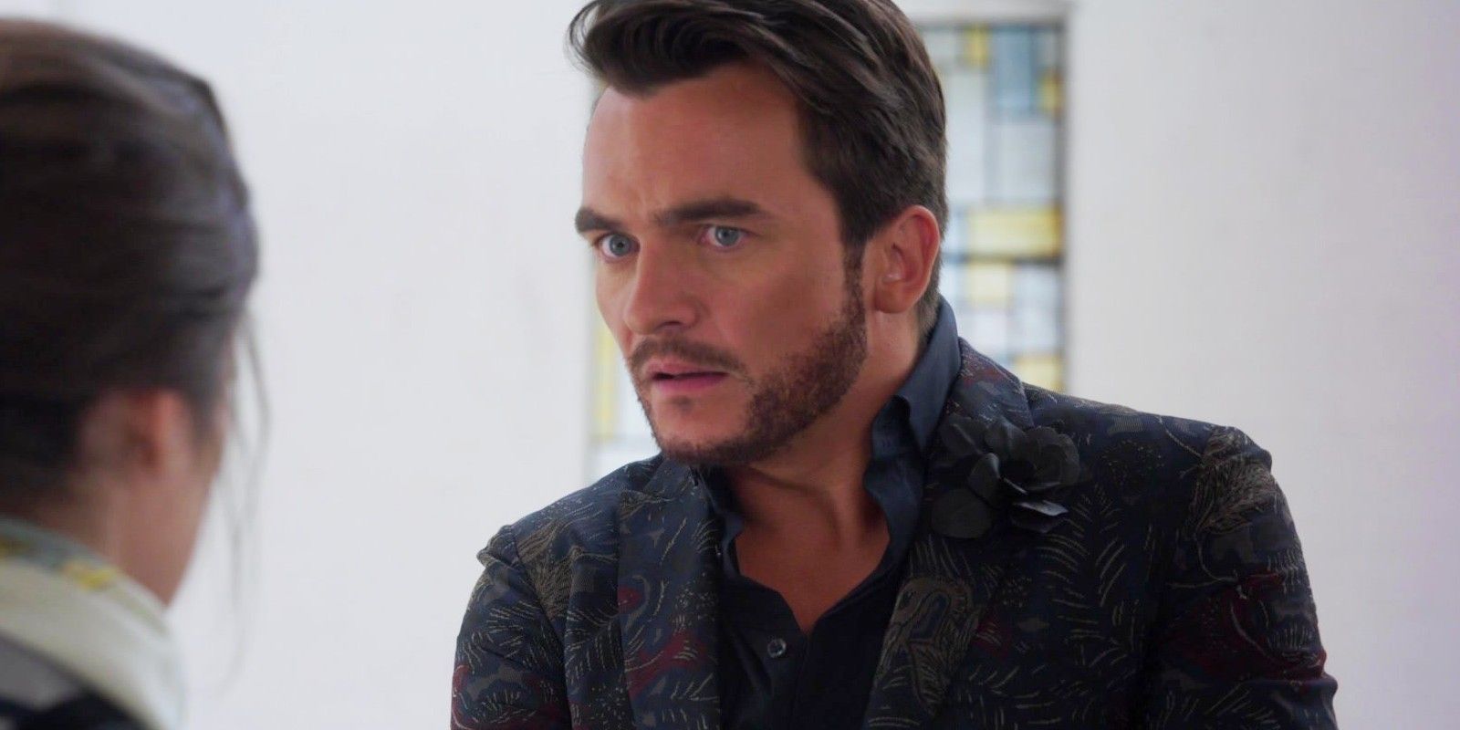 Rupert Friend as Dennis Nylon looking incredulous in A Simple Favor