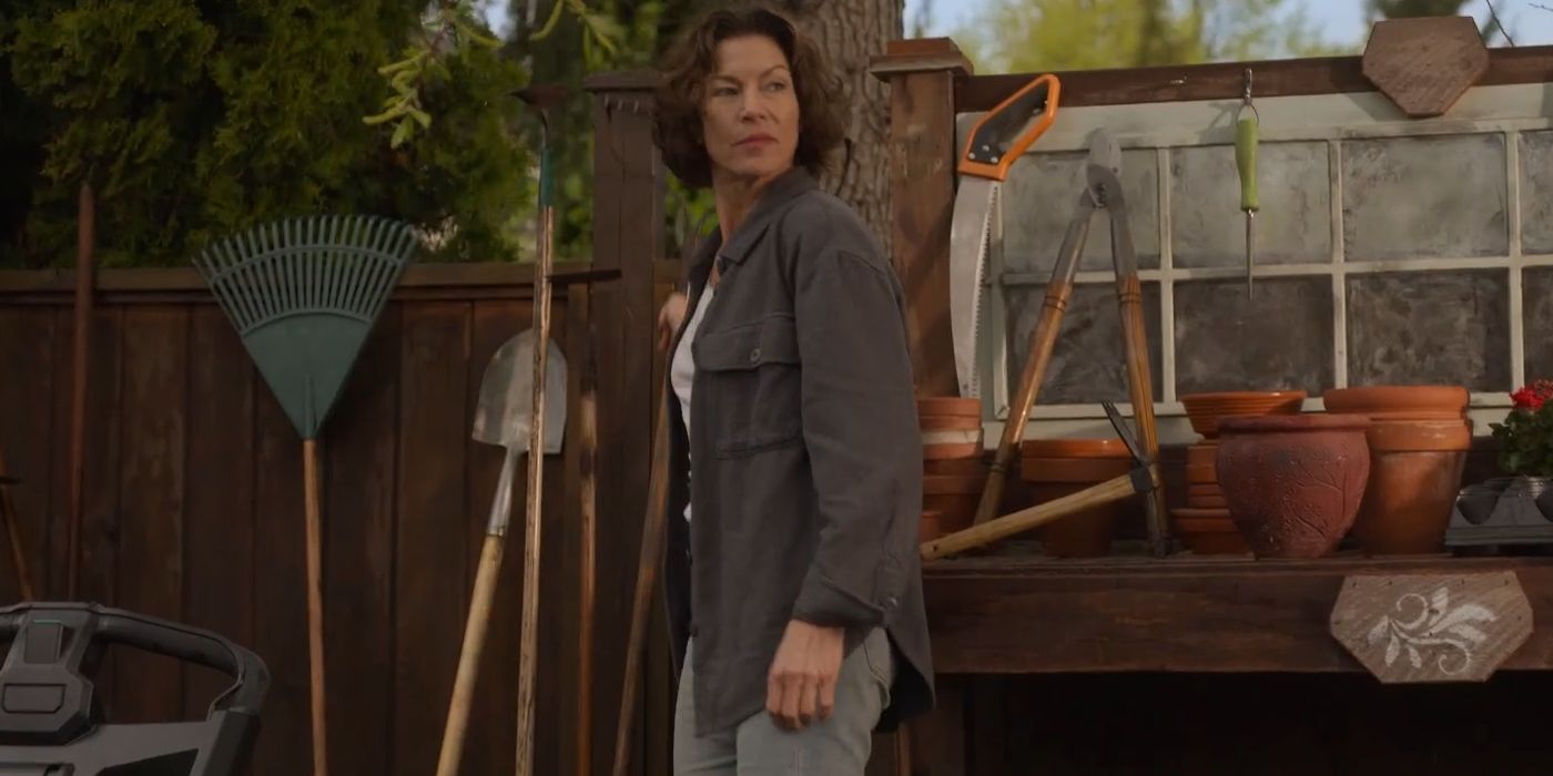 Rya Kihlstedt as Darlene Campbell looking nervous at the barbecue in Final Destination Bloodlines