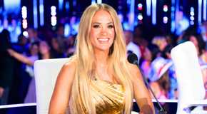 American Idol Judge Carrie Underwood Smiling At The Judges' Table During Season 23