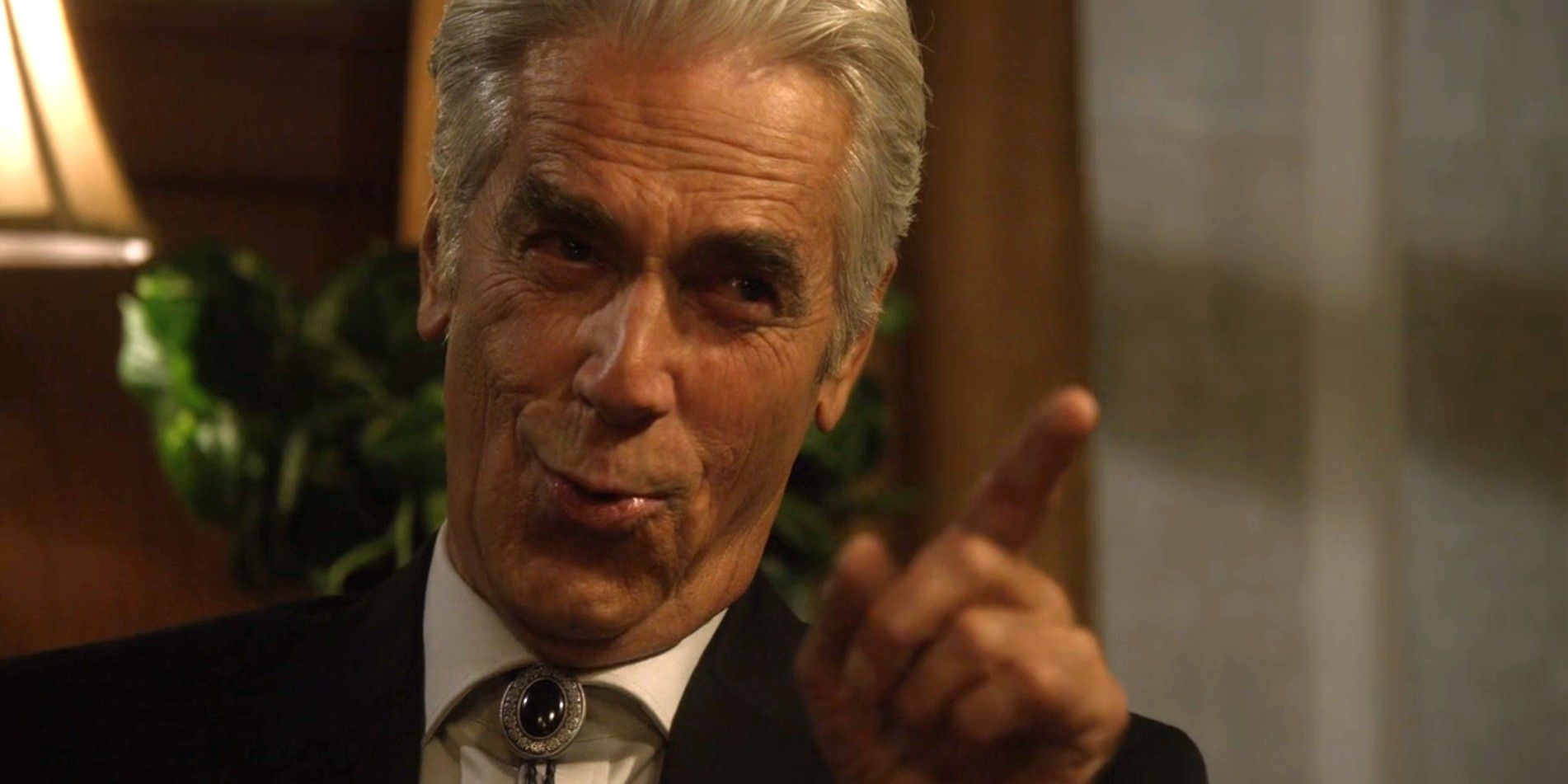 Sam Elliott as Avery Markham wearing a suit and bolo tie in Justified season 6, episode 3