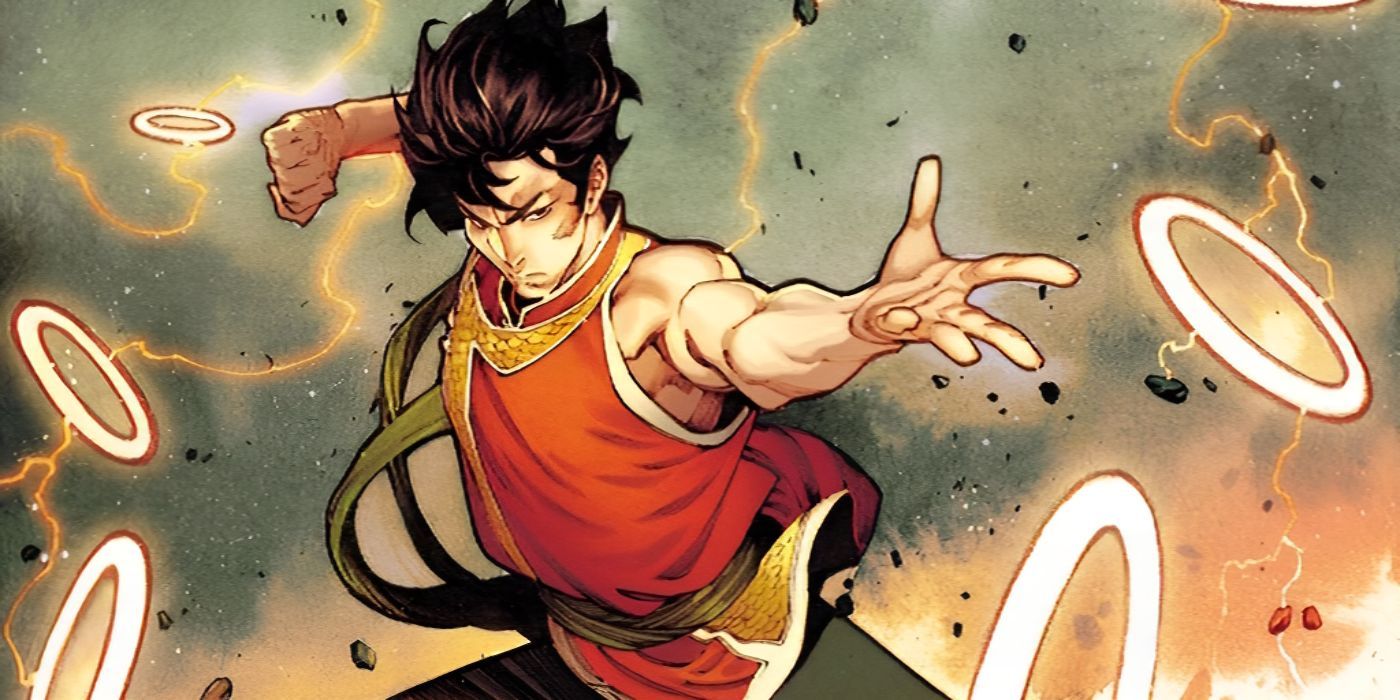 Shang-Chi extends his arm while the Ten Rings fly around