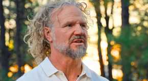Sister Wives Kody Brown close up looking to the side and upset