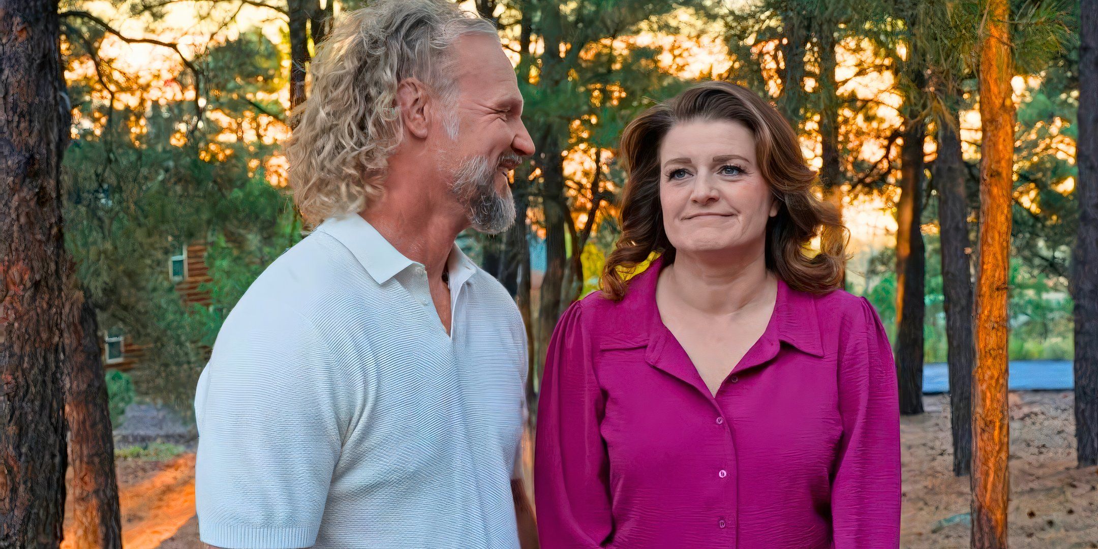 sister wives stars kody and robyn brown smiling outside with trees in the background