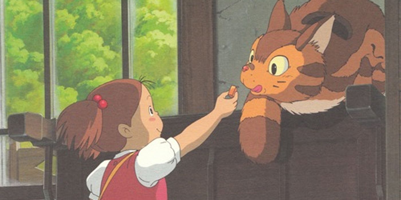 Mei feeds the Kittenbus a candy in the Totoro sequel.