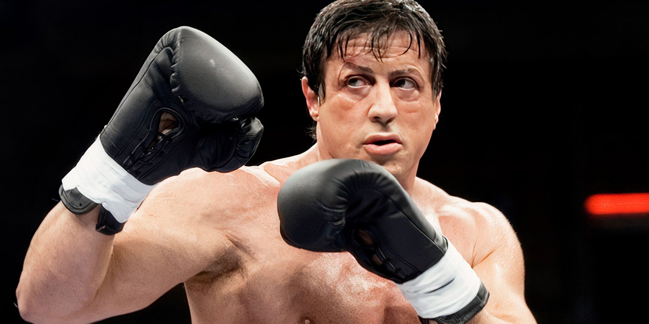 Rocky raising his gloves in Rocky Balboa