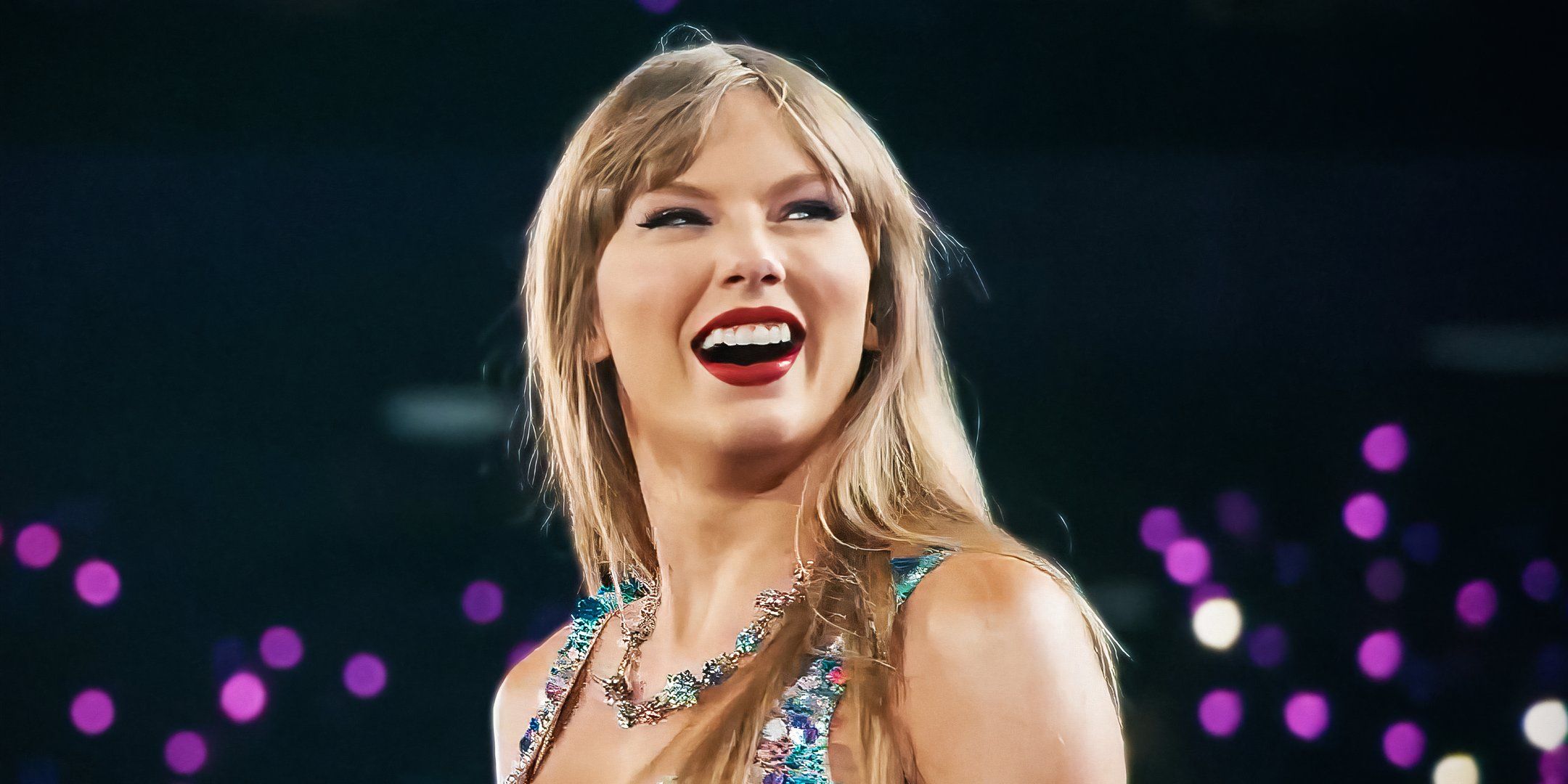 Taylor Swift smiling widely onstage in her Eras Tour documentary