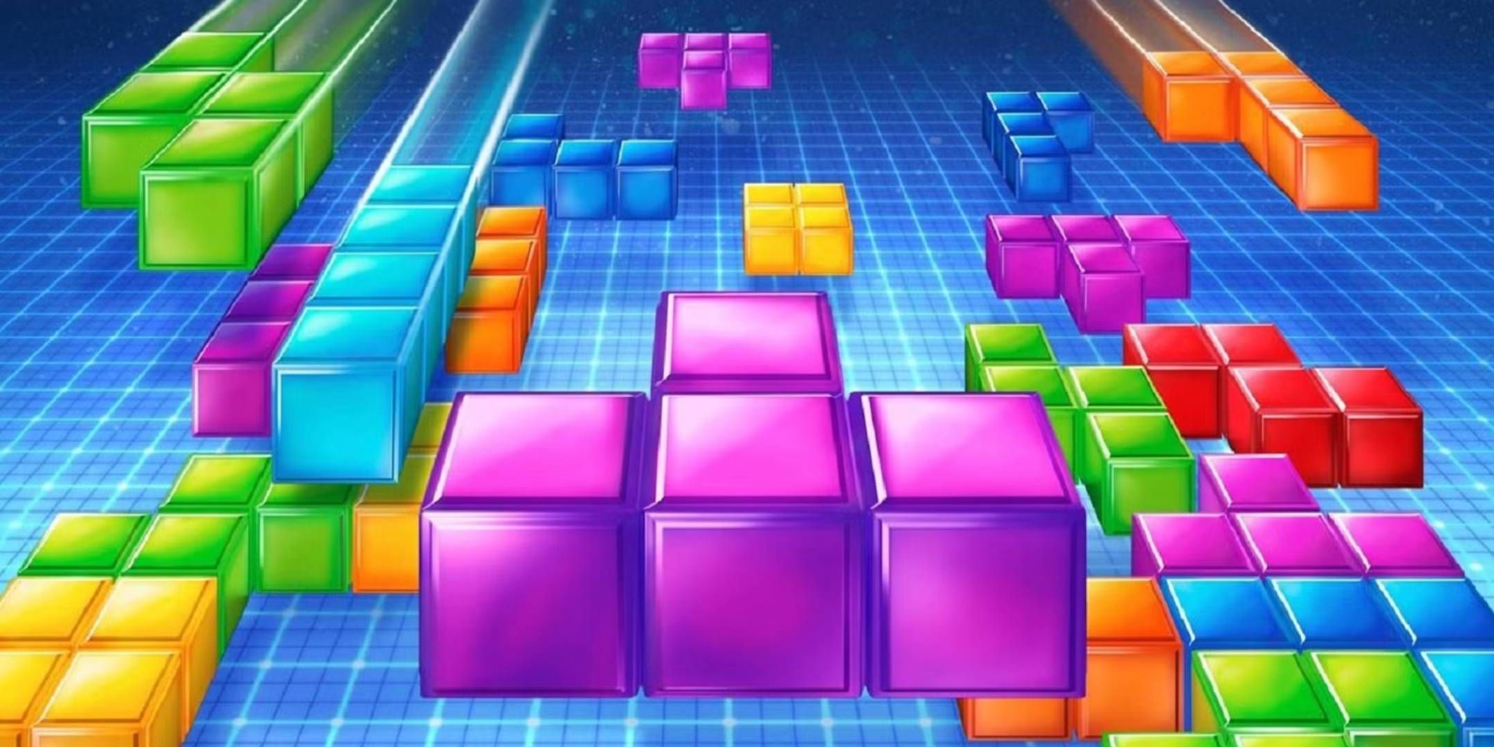 El arte de los bloques de tetris cae sobre un fondo de cuadrícula azul.