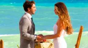 The Bachelor 28 Joey Graziadei & Kelsey Anderson holding hands on a beach close up