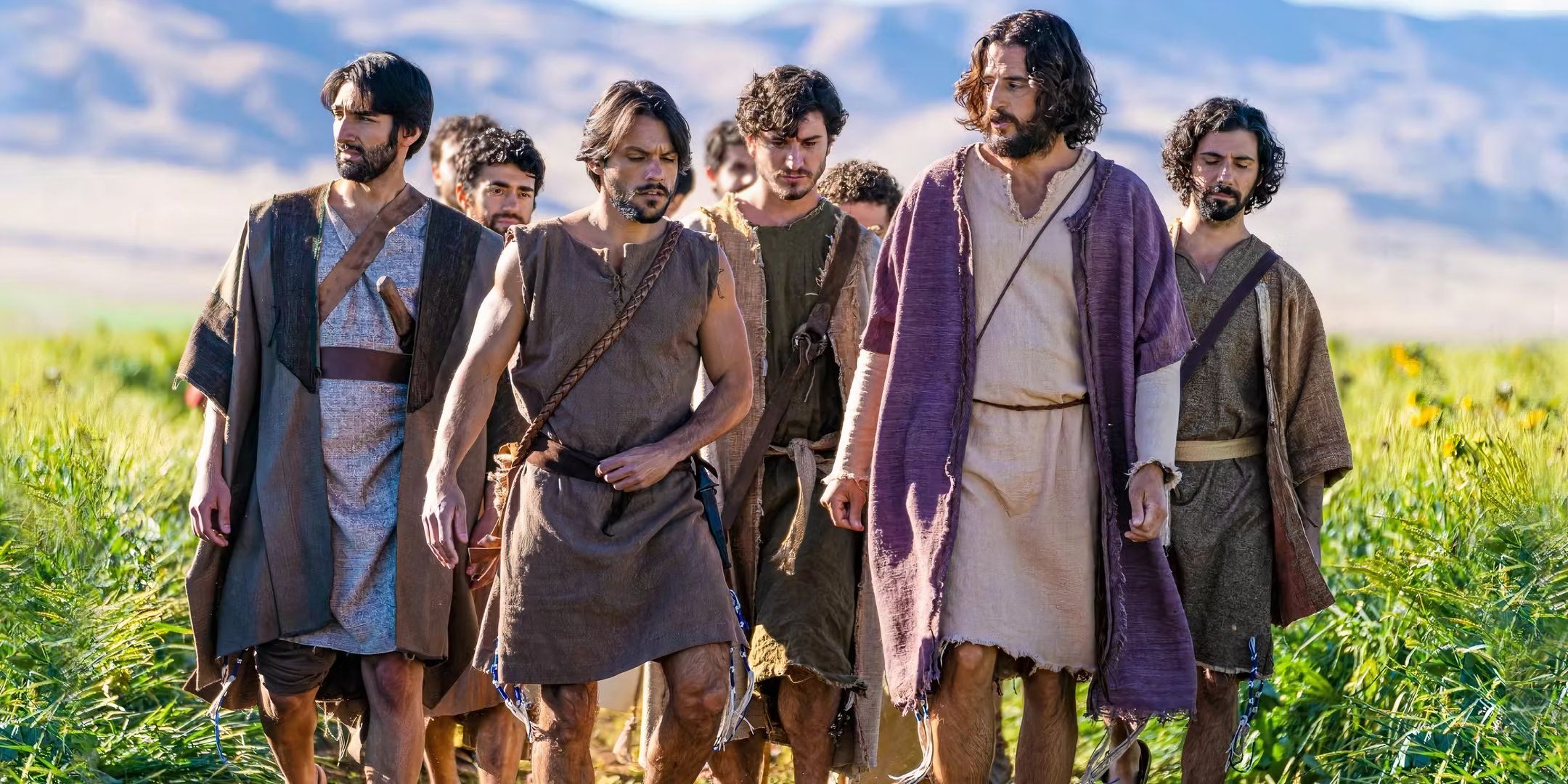 The cast of The Chosen in a field