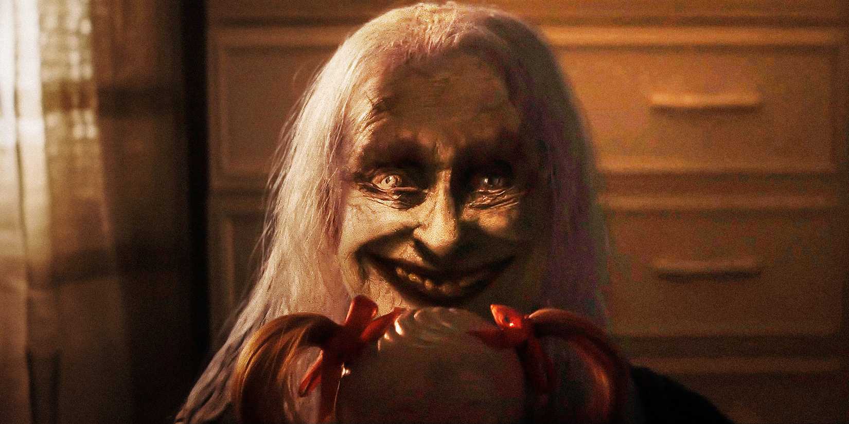 A demonic woman behind a doll in The Conjuring Last Rites