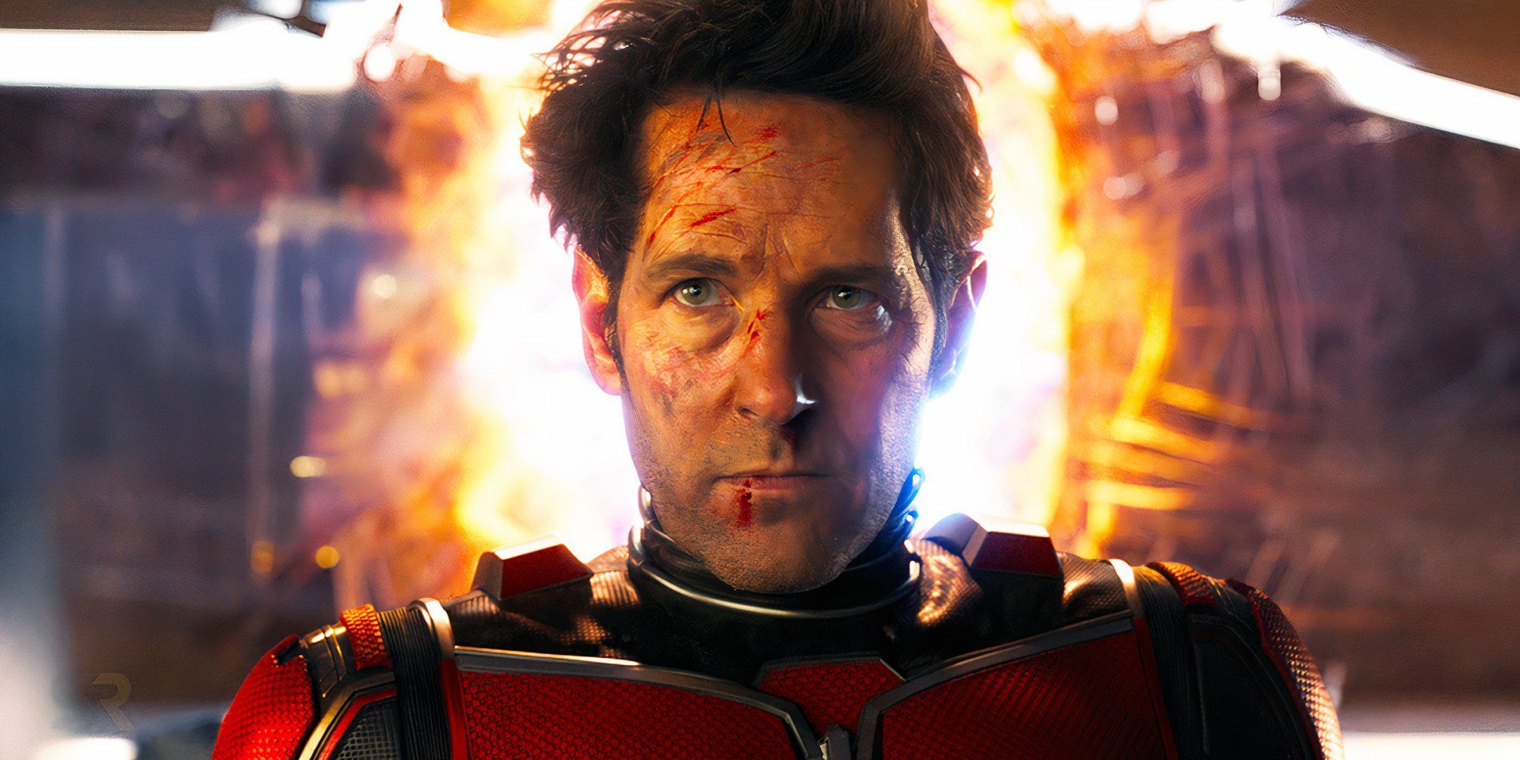 Scott Lang/Ant-Man (Paul Rudd) with his face bloodied and bruised while standing in front of a portal