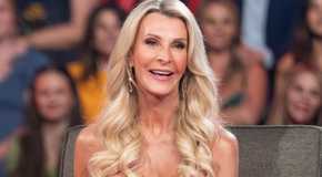 The Golden Bachelorette Joan Vassos close up smiling with audience behind her