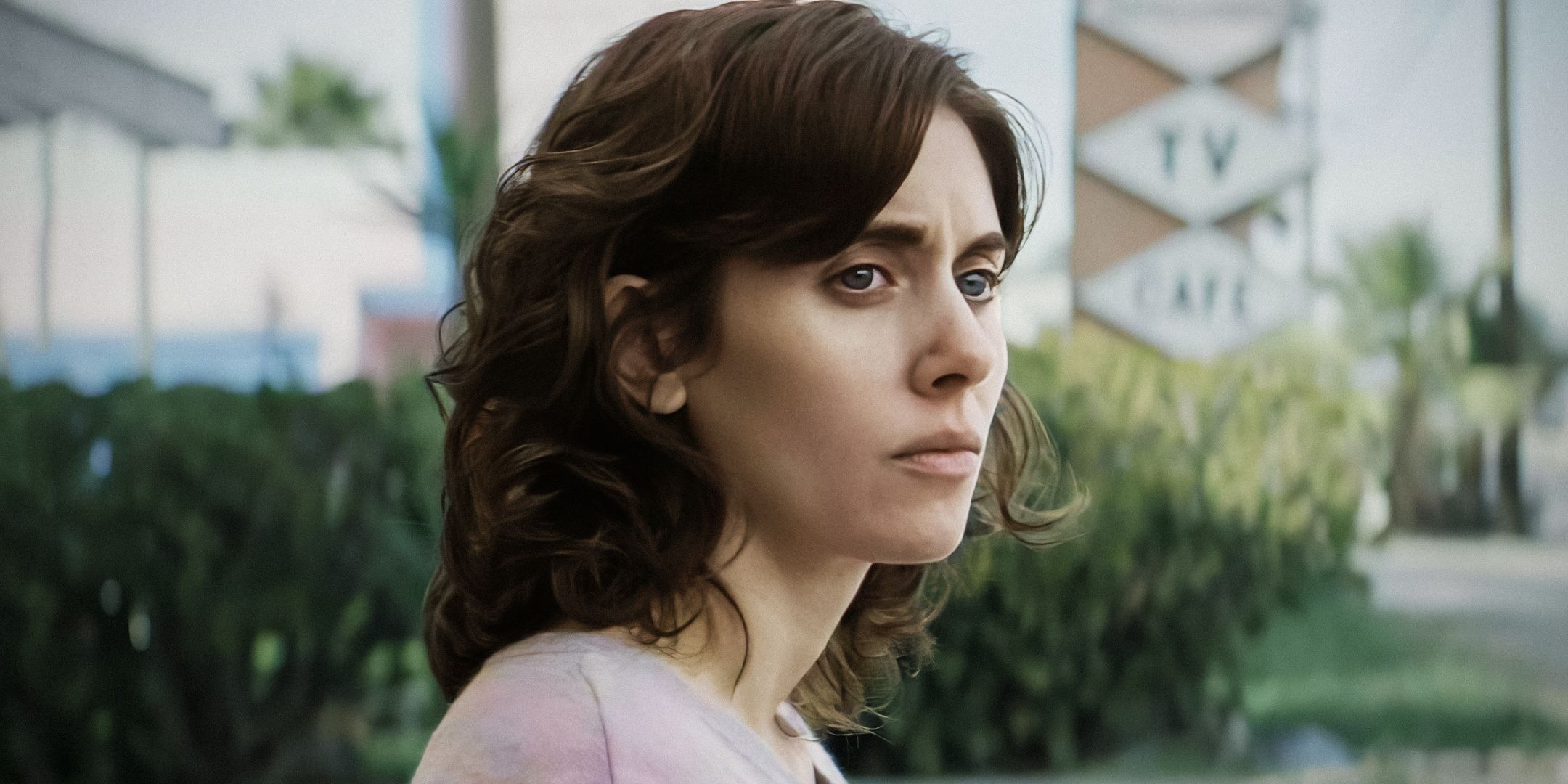 Alison Brie as Ruth looking sad in GLOW