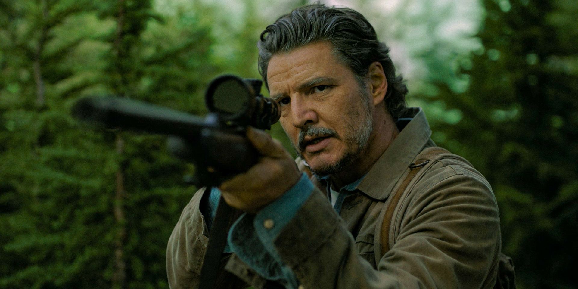 Joel Miller (Pedro Pascal) aiming his gun in The Last of Us Season 2 Ep 6