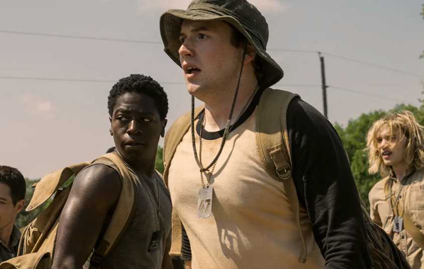 Cooper Hoffman looking shocked in The Long Walk while David Jonsson looks on