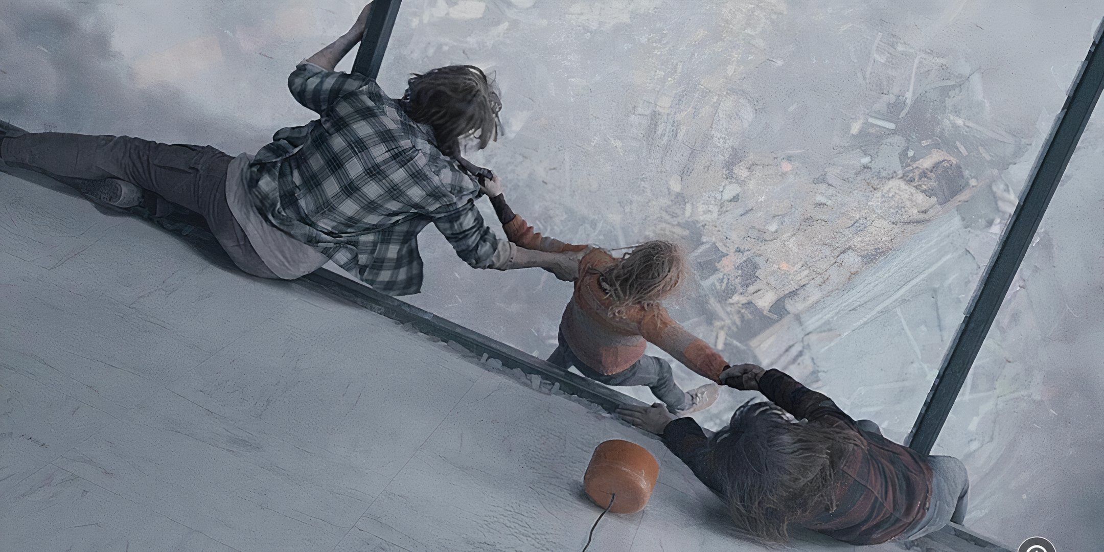 Two people hold the arms of a young girl falling out of a shattered window. 