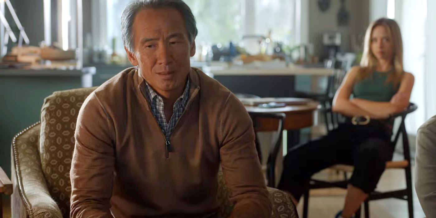 Tinpo Lee as Marty Reyes looking concerned at the family meeting in Final Destination Bloodlines