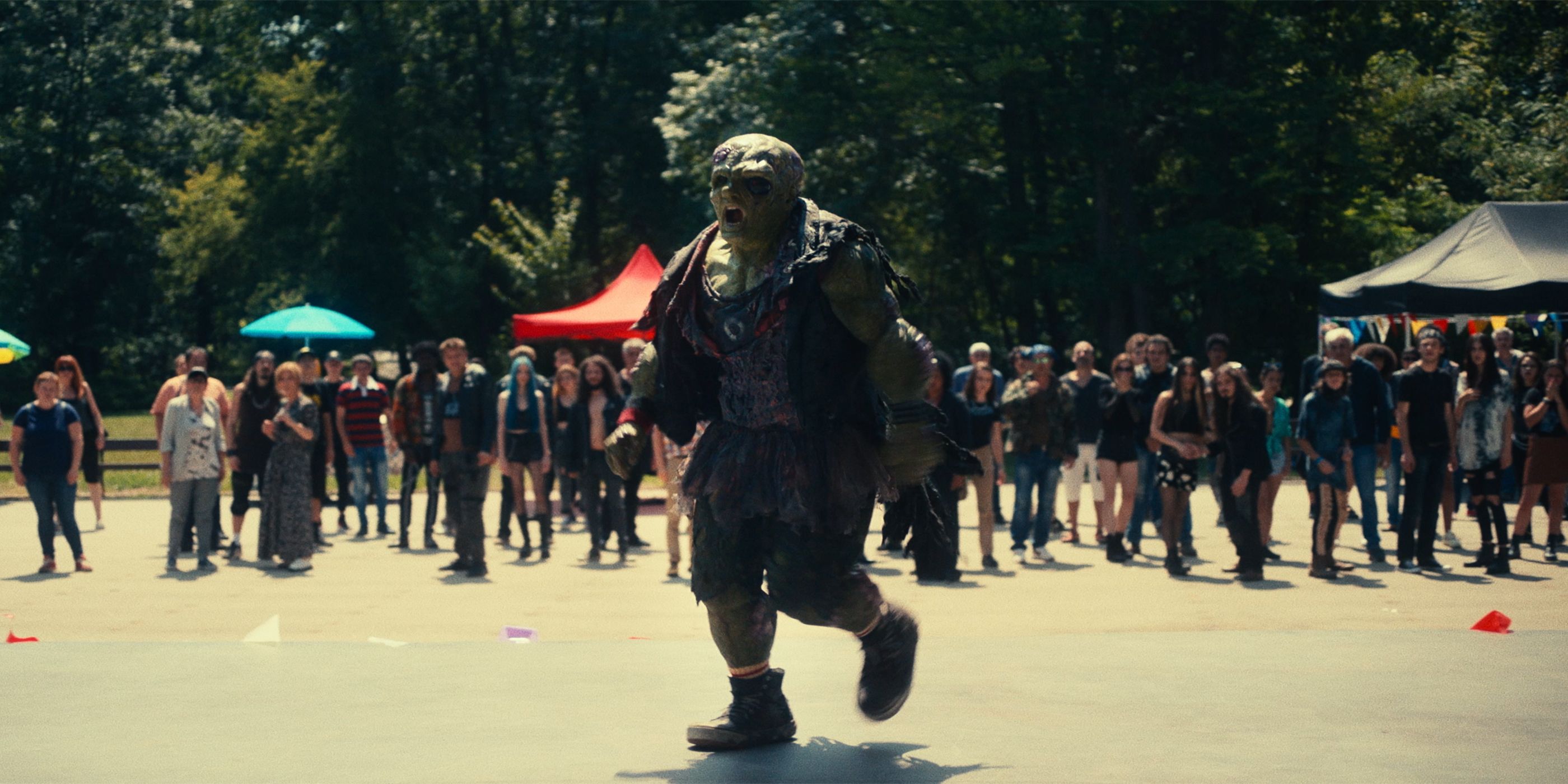Toxie storming the concert in The Toxic Avenger