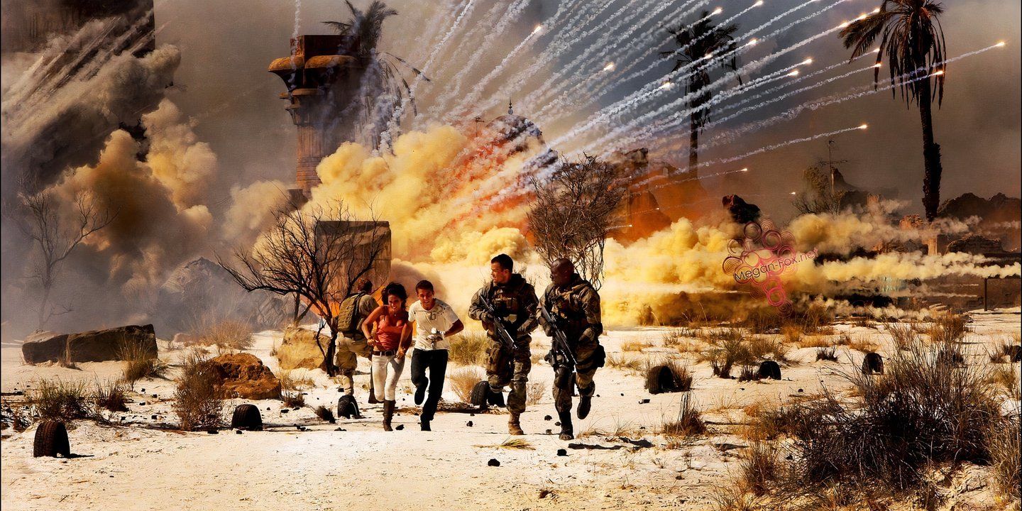 Sam and Mikaela run from an explosion with the military in Transformers: Revenge of the Fallen