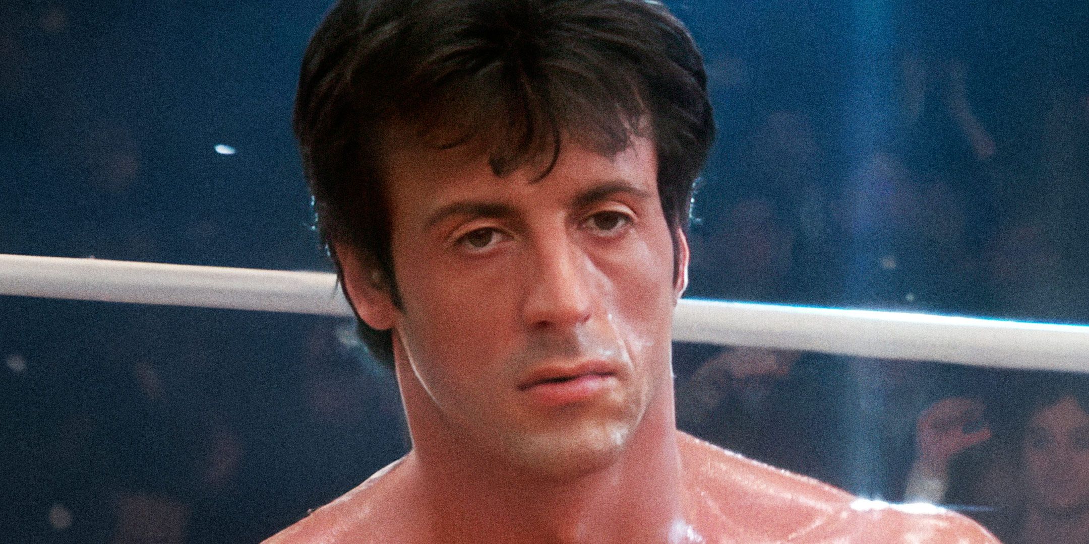 Sylvester Stallone looks defeated in a scene from Rocky IV