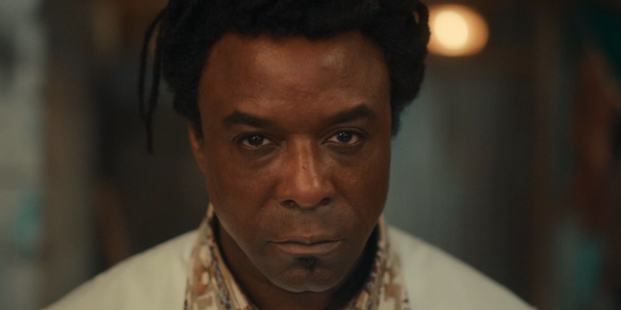 Ariyon Bakare as the Barber looking stern in Doctor Who