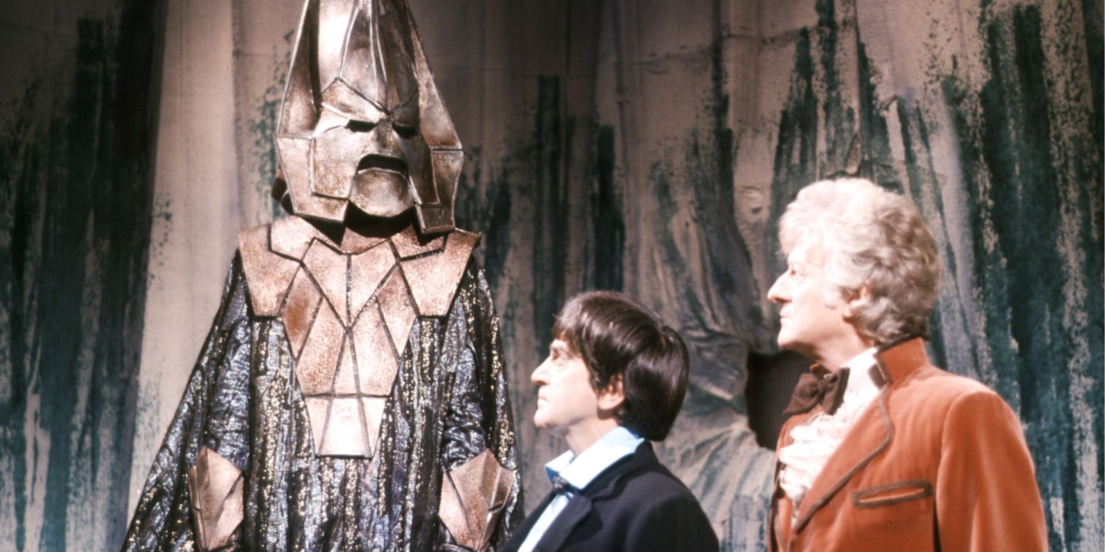 Omega in Doctor Who standing with Patrick Troughton's Second Doctor and Jon Pertwee's Third Doctor