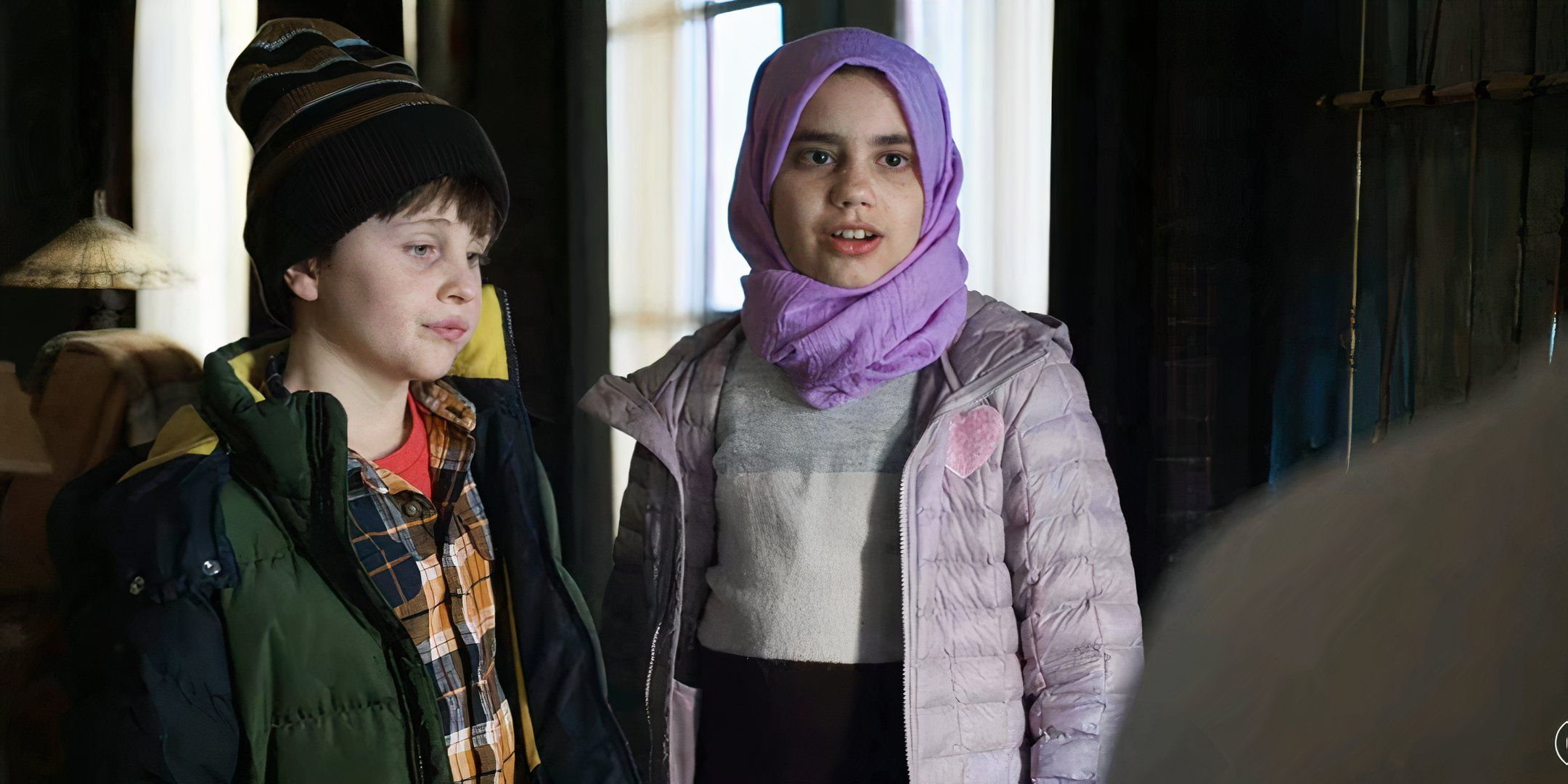 Judah Prehn as Max and Gracelyn Awad Rinke as Sahar in Resident Alien