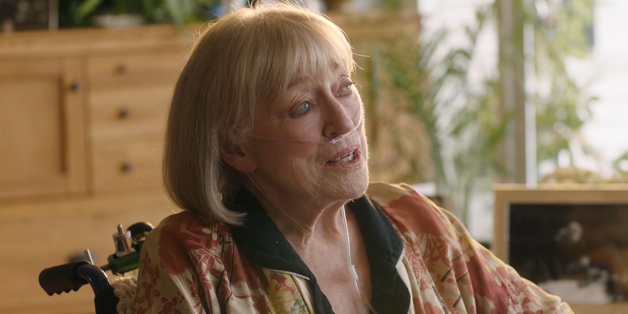 Veronica Cartwright as Olivia sitting in her wheelchair in the living room in The Ruse