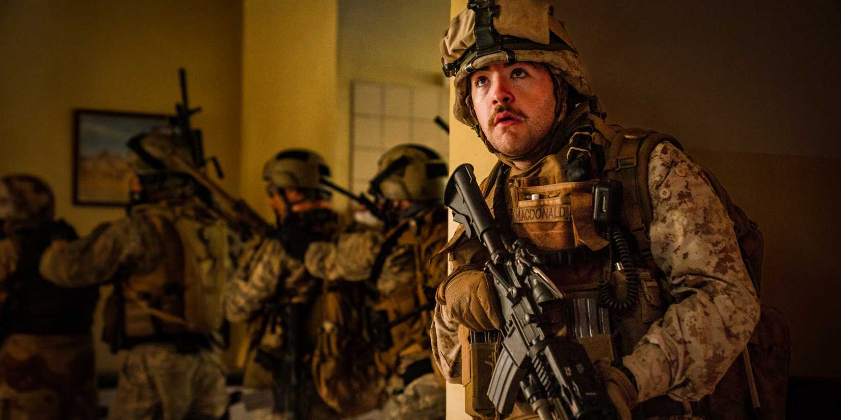 American Navy SEALs on a surveillance mission gone wrong in insurgent territory in Warfare by A24