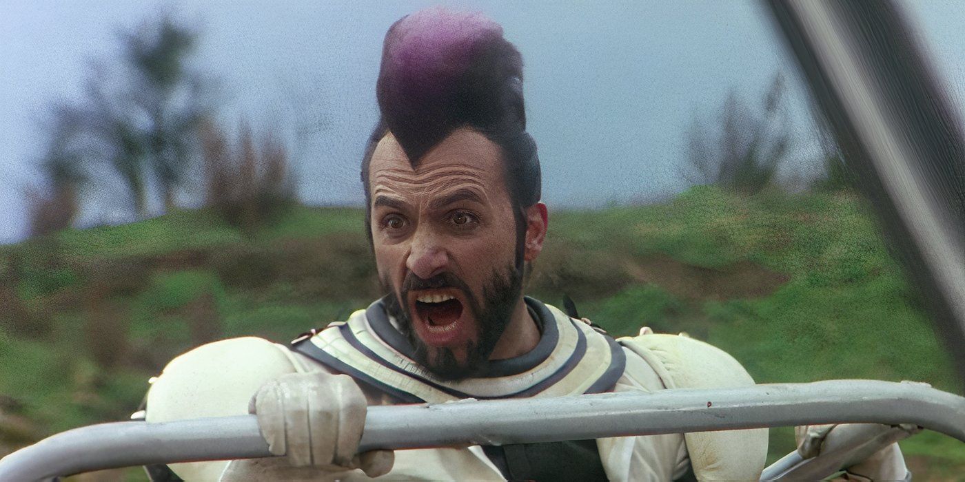 A man with a purple mohawk screams in Warriors of the Wasteland