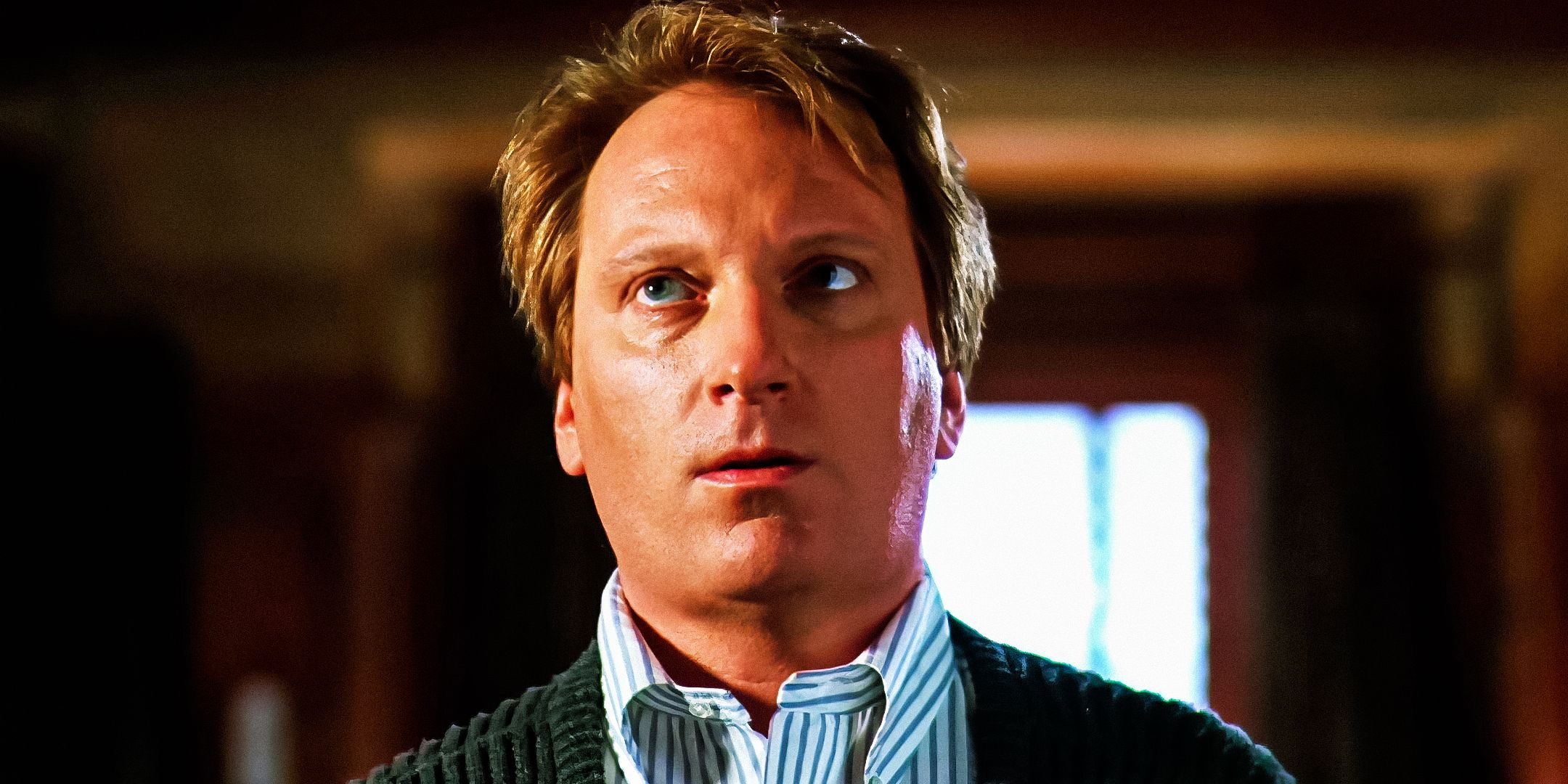 Jeffrey Jones looking scared as Charles Deetz In Beetlejuice.