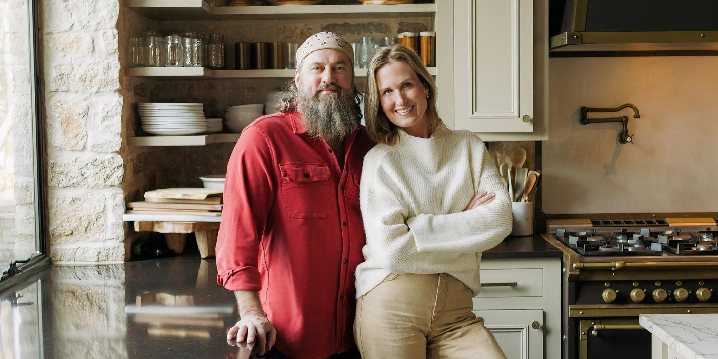 Duck Dynasty: The Revival's Willie and Korie Robertson posing together in a kitchen