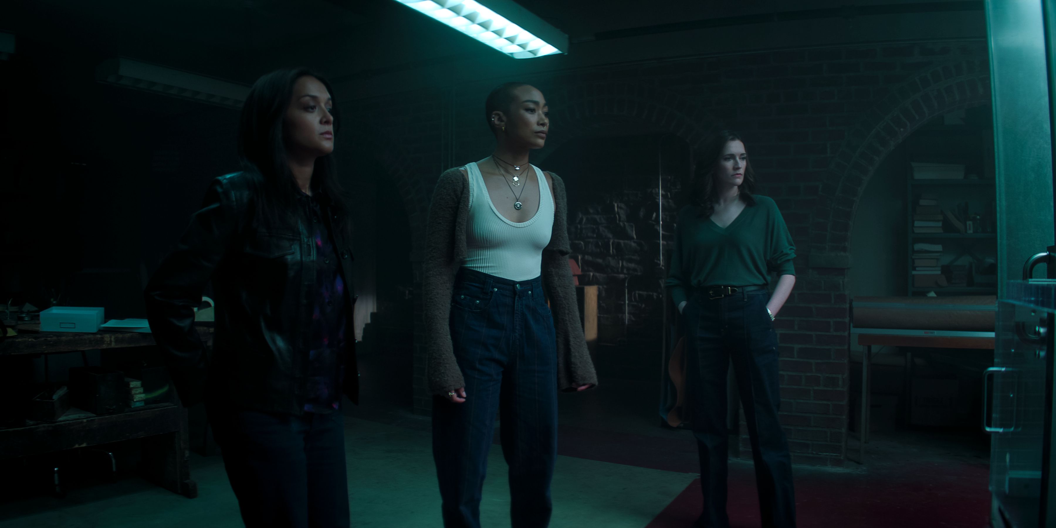 Nadia, Marienne, and Kate stand outside the cage in You season 5