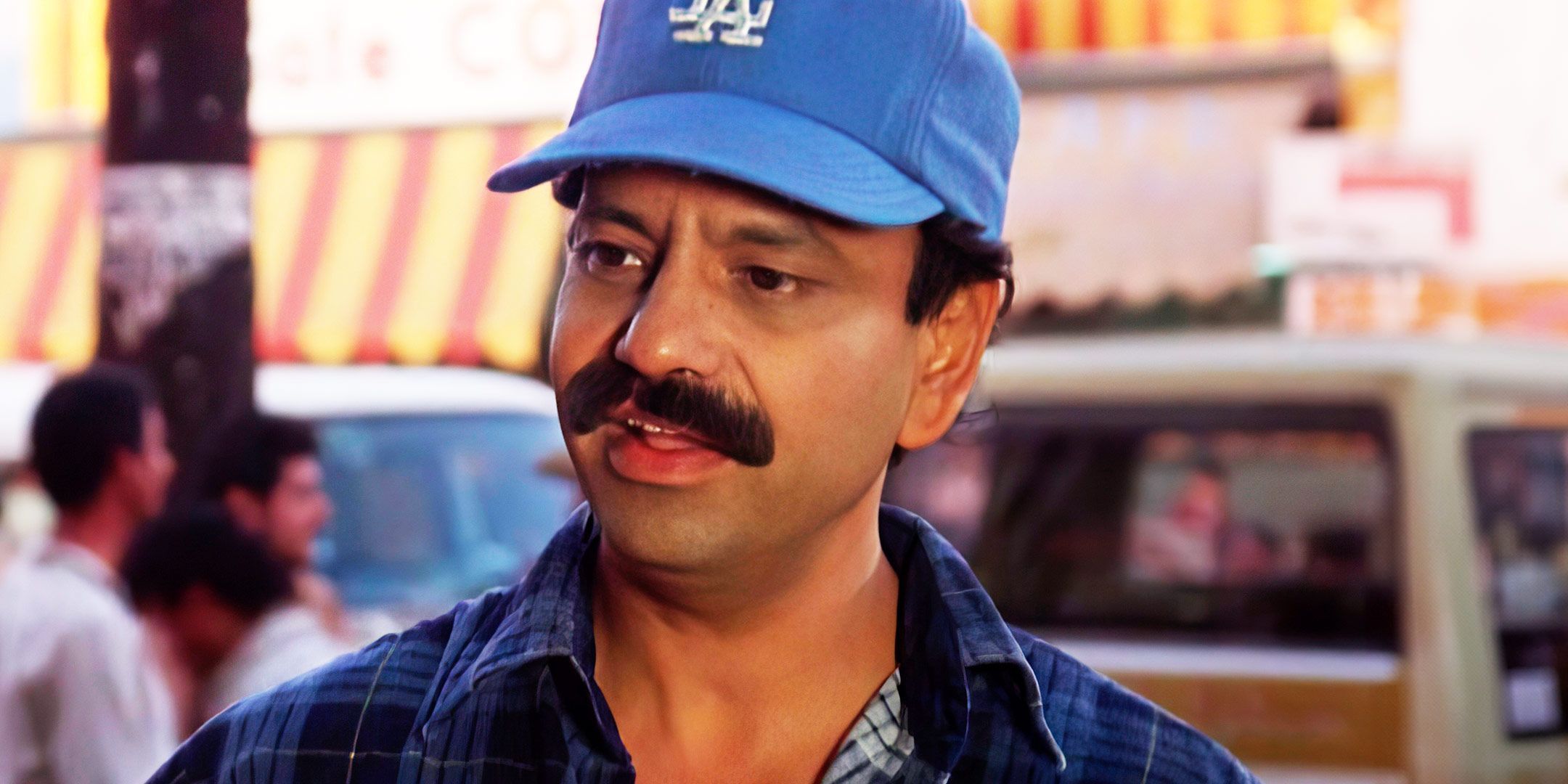Cheech Marin as Rudy wearing an L.A. Dodgers hat in Born in East L.A.
