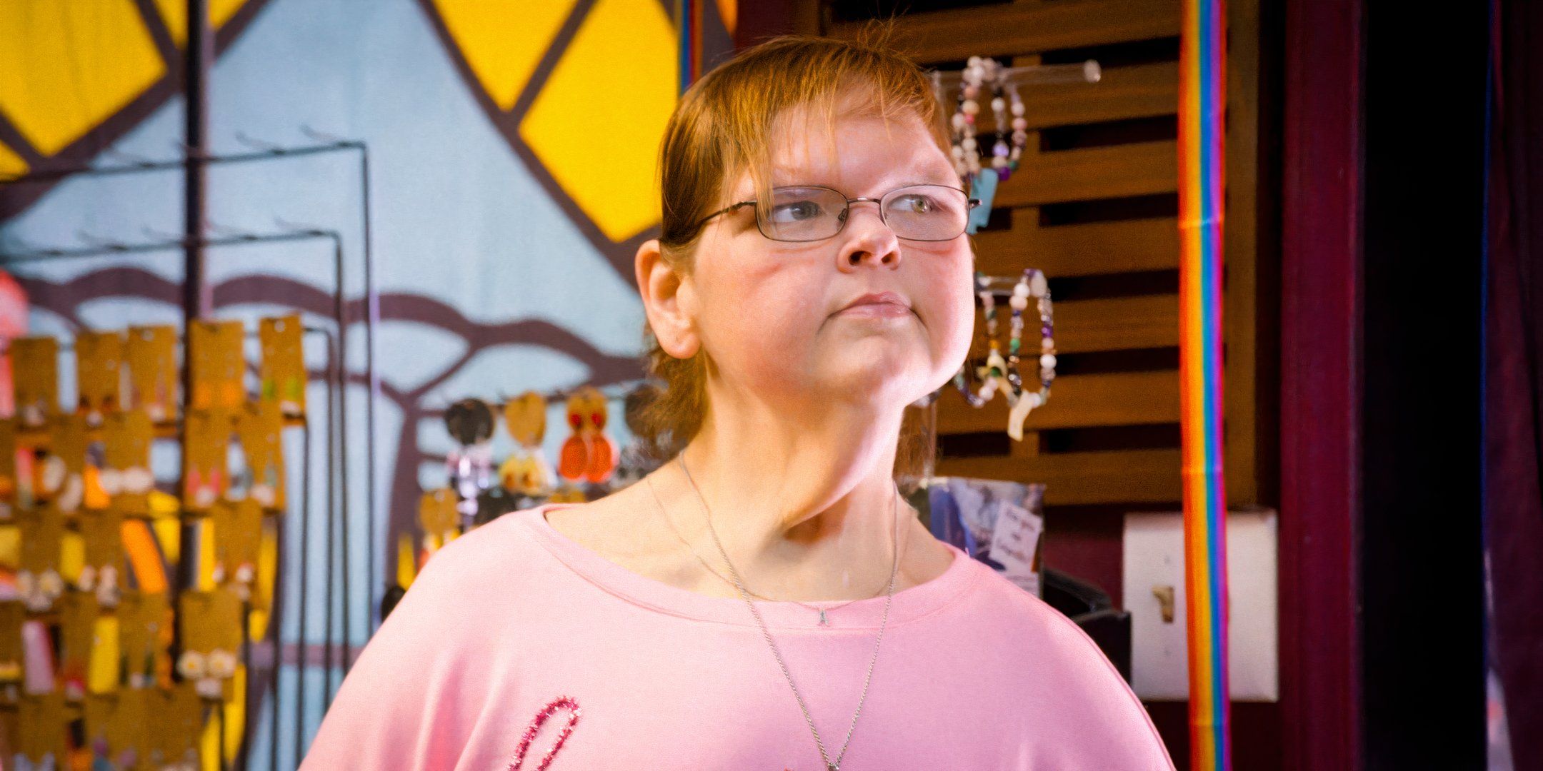 1000-Lb Sisters Tammy Slaton looking away wearing pink shirt