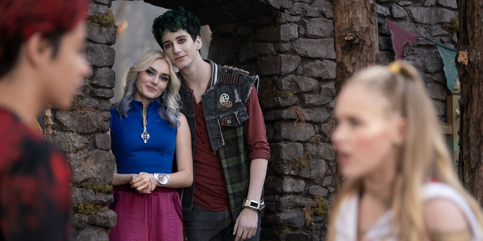 Addison and Zed smiling at Victor and Nova in Zombies 4: Dawn of the Vampires