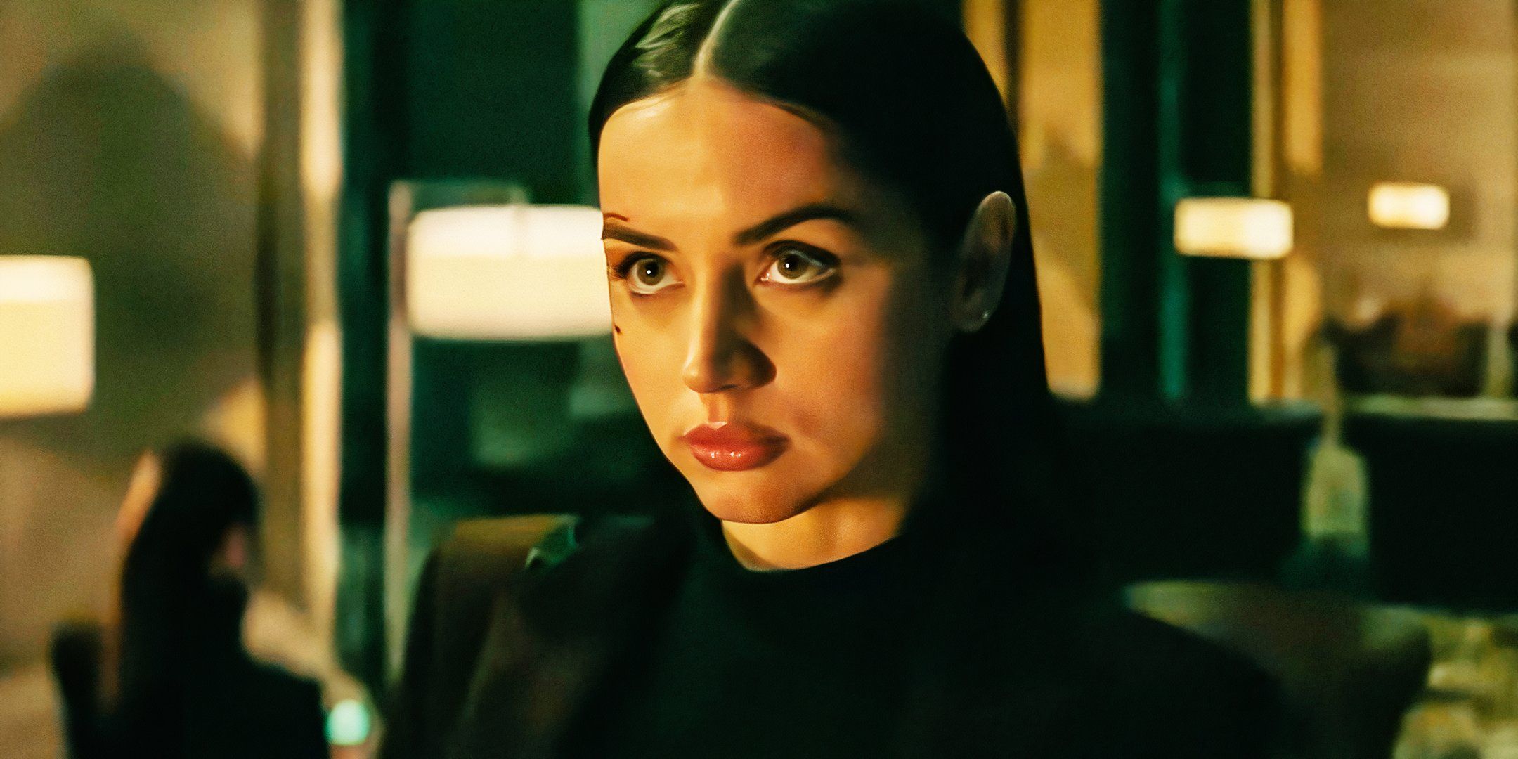 Ana de Armas looking up in Ballerina.
