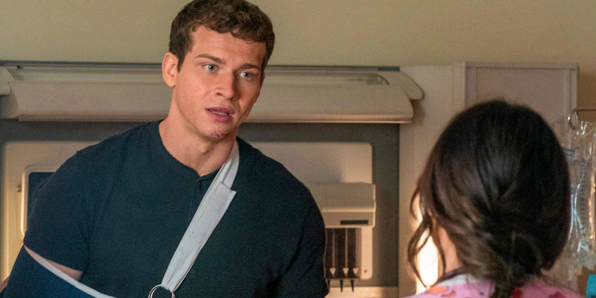 Oliver Stark as Evan "Buck" Buckley looking sadly at Jennifer Love Hewitt's Maddie in 9-1-1 season 4, episode 5.