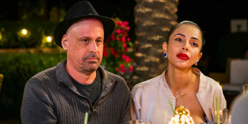 90 Day Fiancé’s Gino Palazzolo and Jasmine Pineda sit next to each other with serious expressions