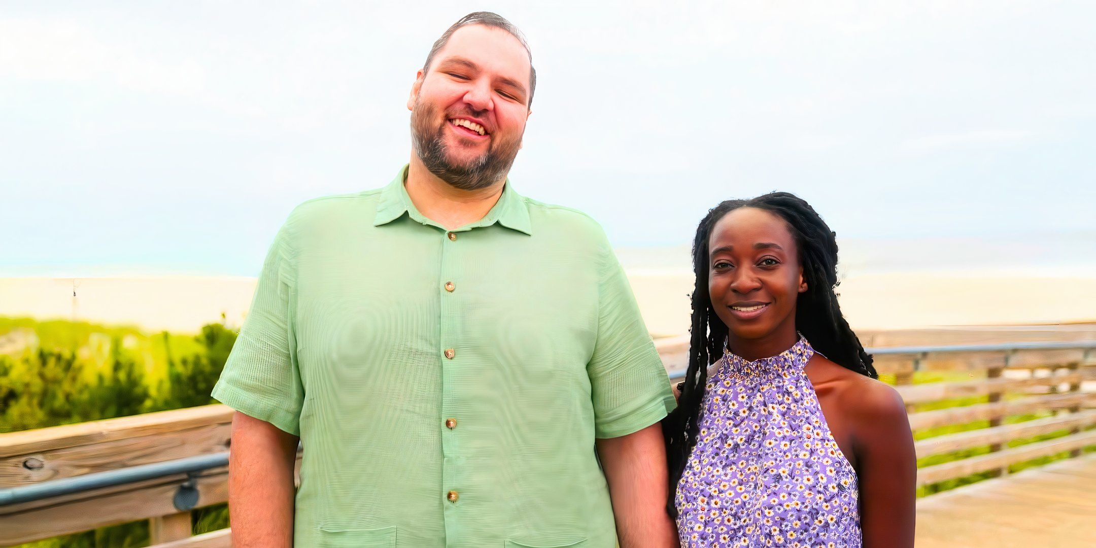 90 Day Fiance stars Greg Chillak and Joan Kruchov smiling outside in pastel outfits