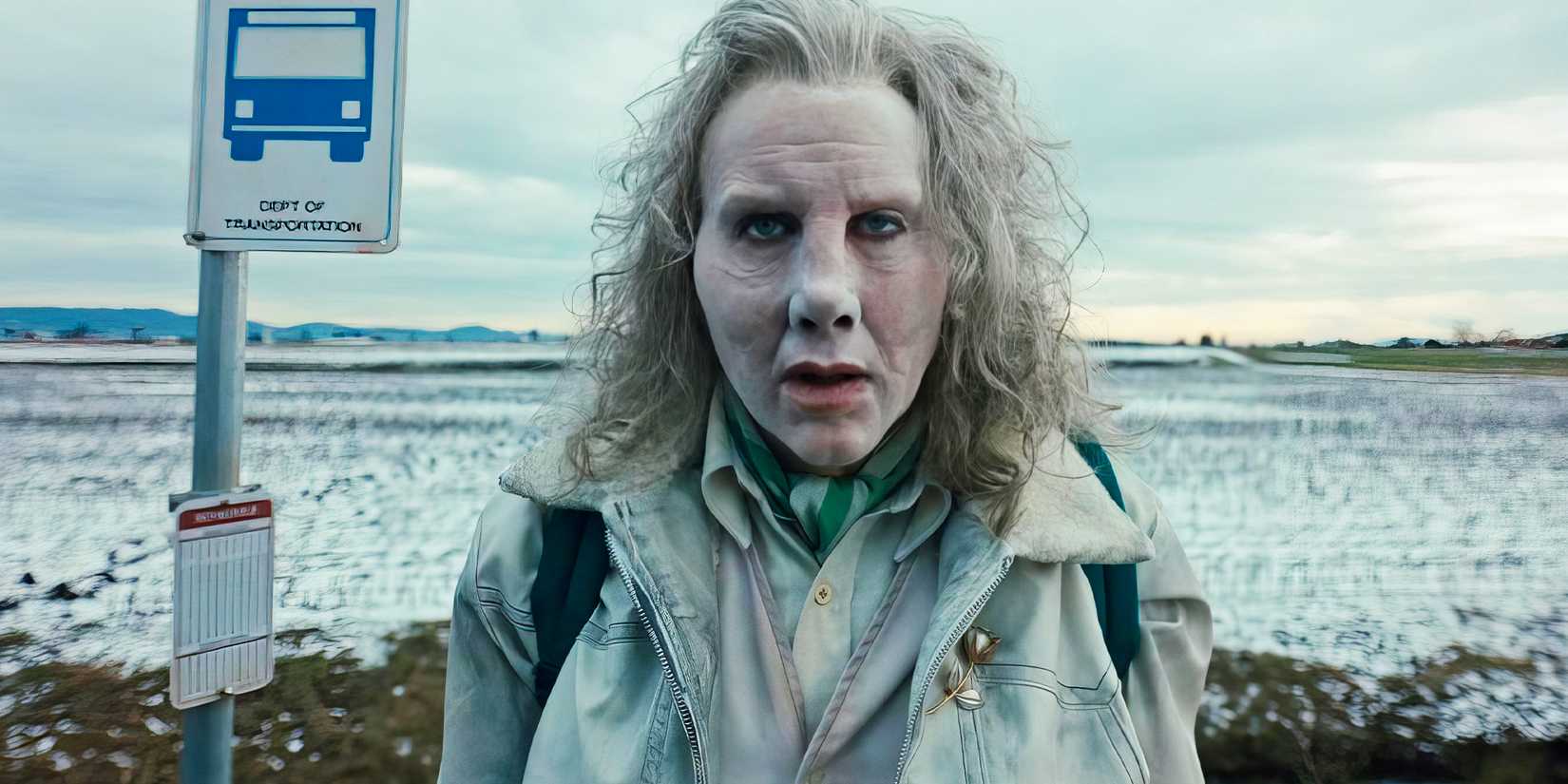 A Character Standing By A Bus Stop In Longlegs